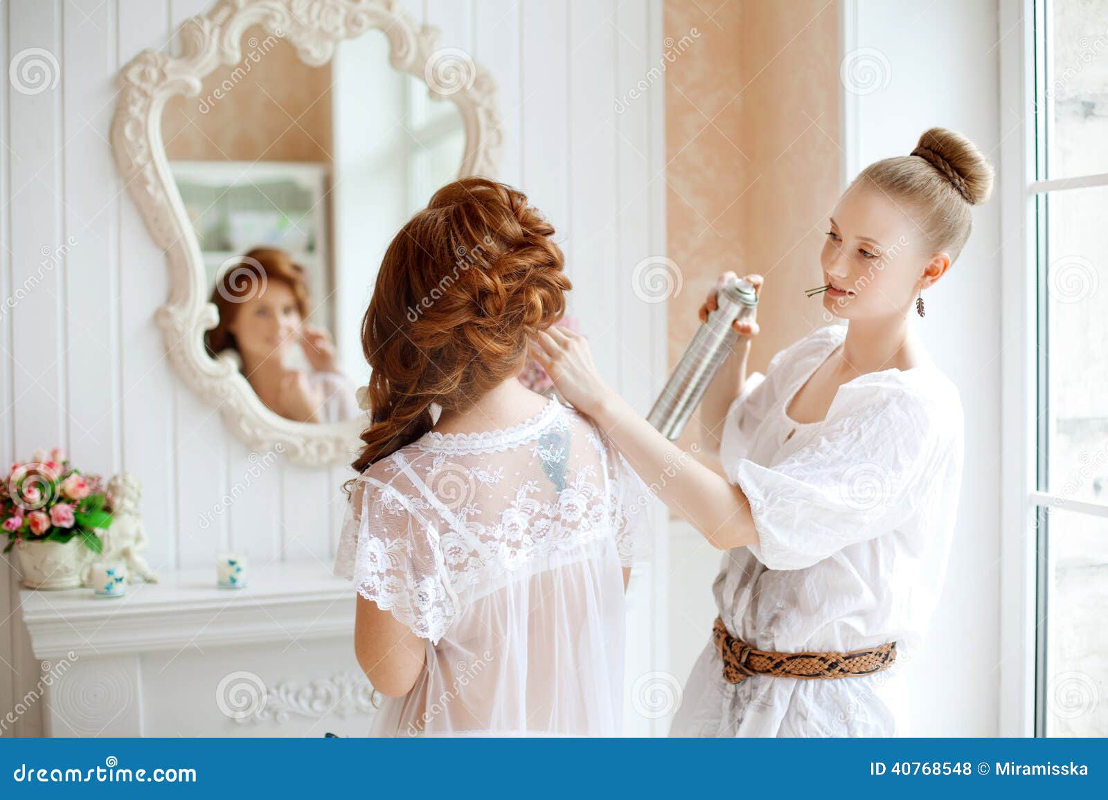 Hair Stylist Makes The Bride On The Wedding Day Stock Photo