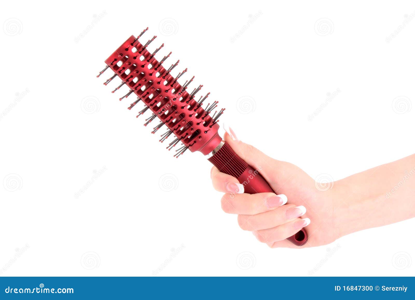 Hairbrush in hand isolated stock photo. Image of hair 16847300