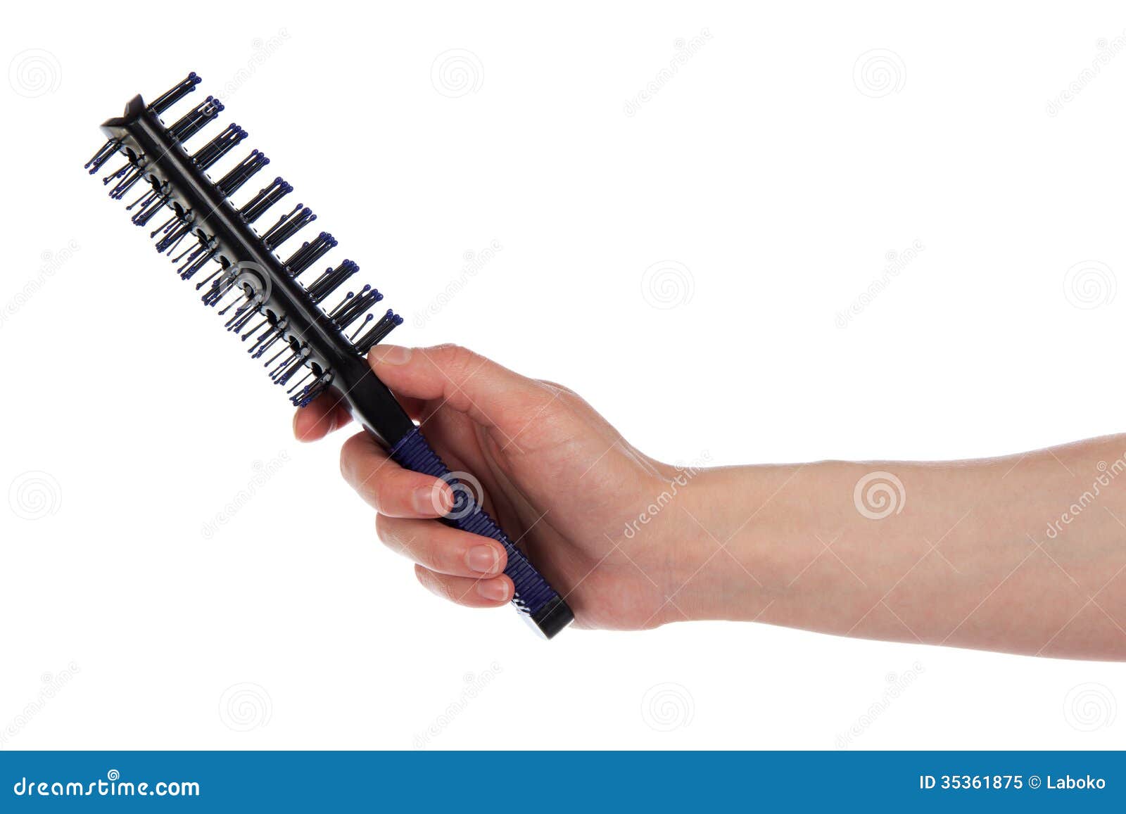Hairbrush in a hand stock image. Image of hand, haircare 35361875