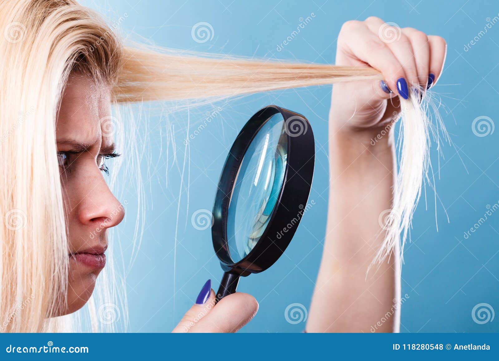 Woman Looking At Hair Through Magnifying Glass Stock Photo Image Of