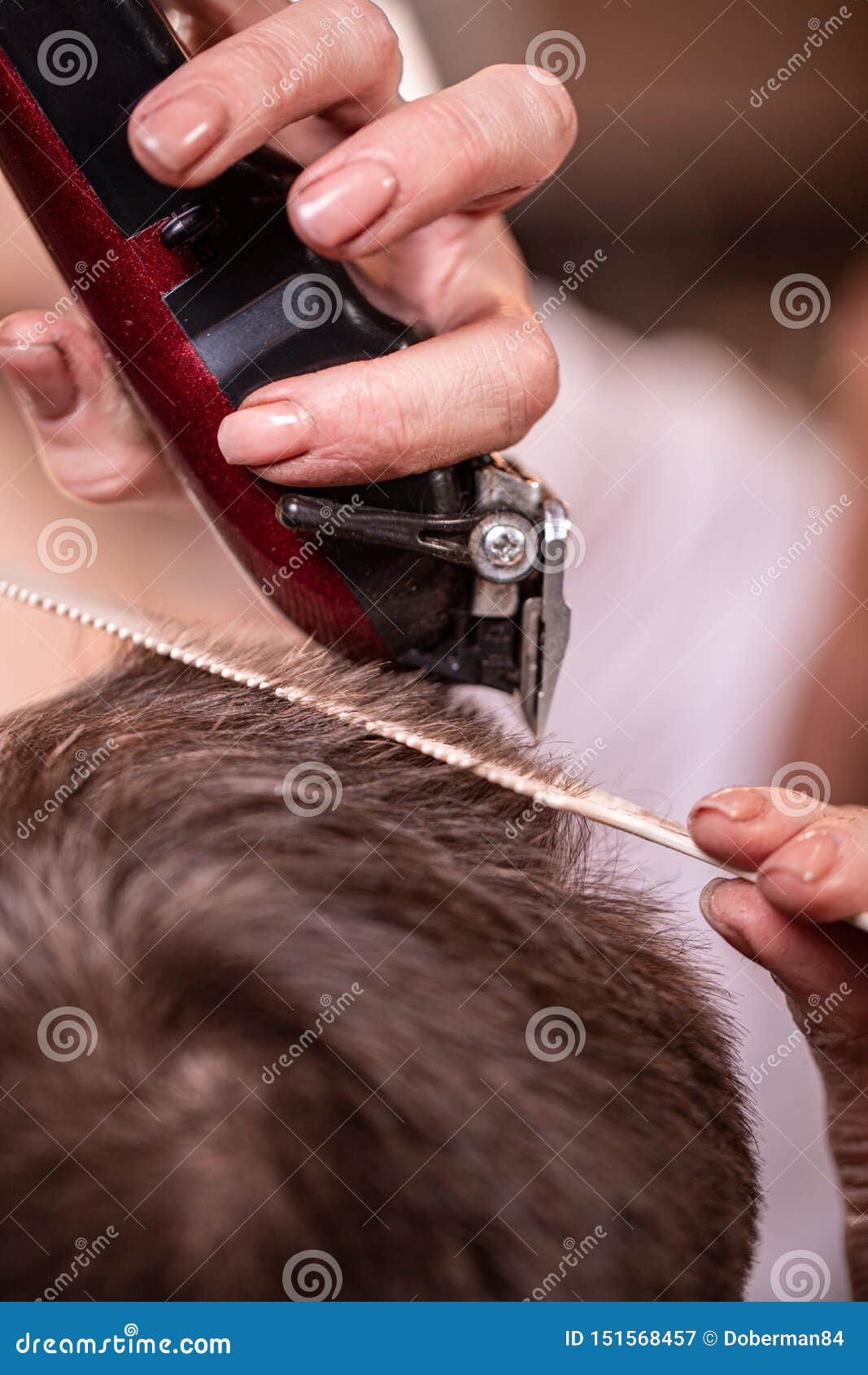 Haircut Closeup. Hands Holding A Hair Clipper. Barber ...
