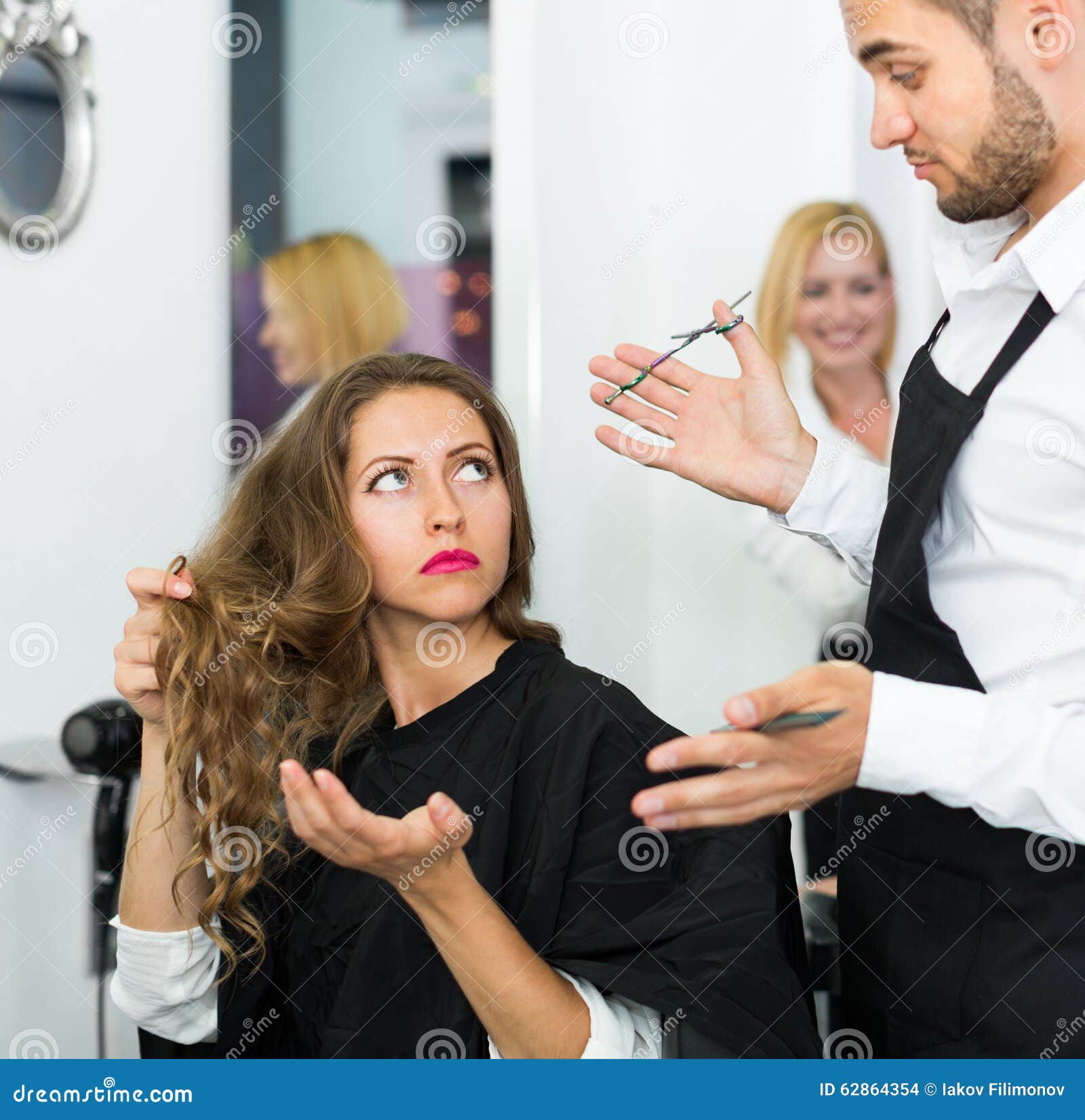 Haircutter Quarrels with the Client Stock Photo Image of barber