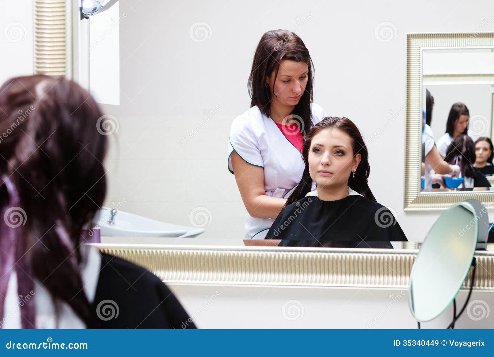 Hairdresser Applying Color Female Customer At Salon, Doing 