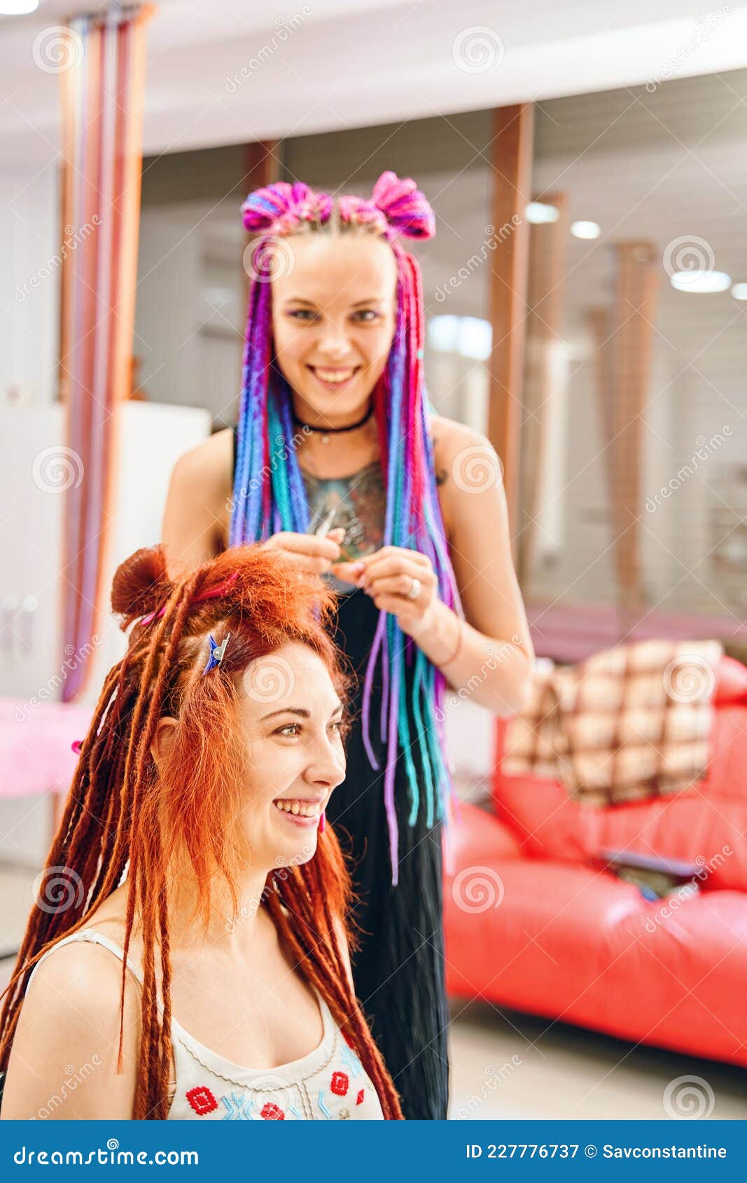 https://thumbs.dreamstime.com/z/hairdresser-colored-afro-braids-weaves-ginger-dreadlocks-happy-girl-woman-smile-weaving-process-kanekalon-hippie-boho-227776737.jpg