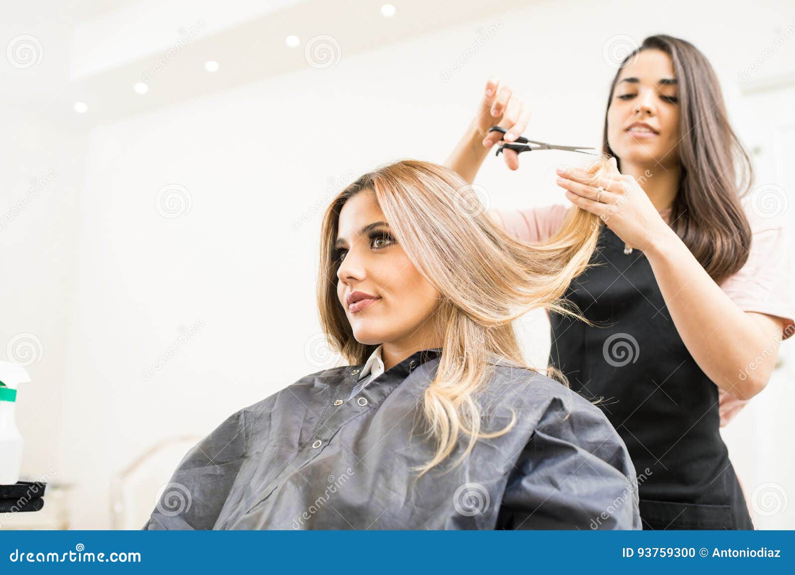 hairdresser cutting some hair tips