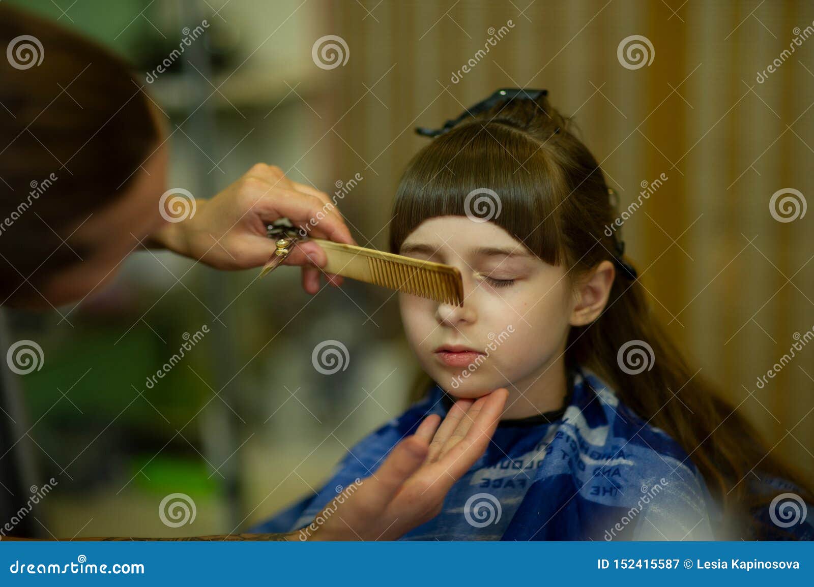 Hairdresser Making A Hair Style To Cute Little Girl Stock