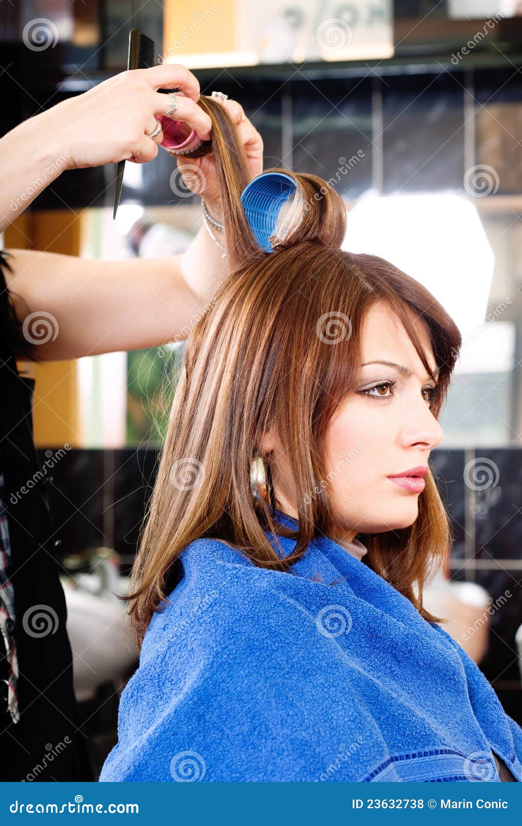 Hairdresser Putting Rollers On Hair Stock Photo - Image 