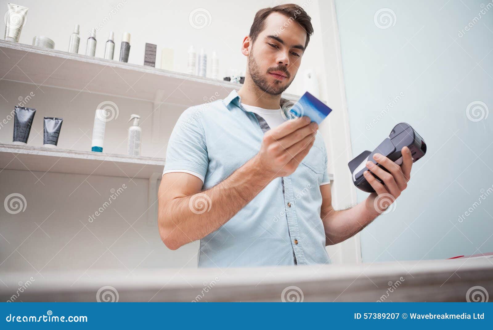 Hairdresser Using a Credit Card Stock Image Image of profession