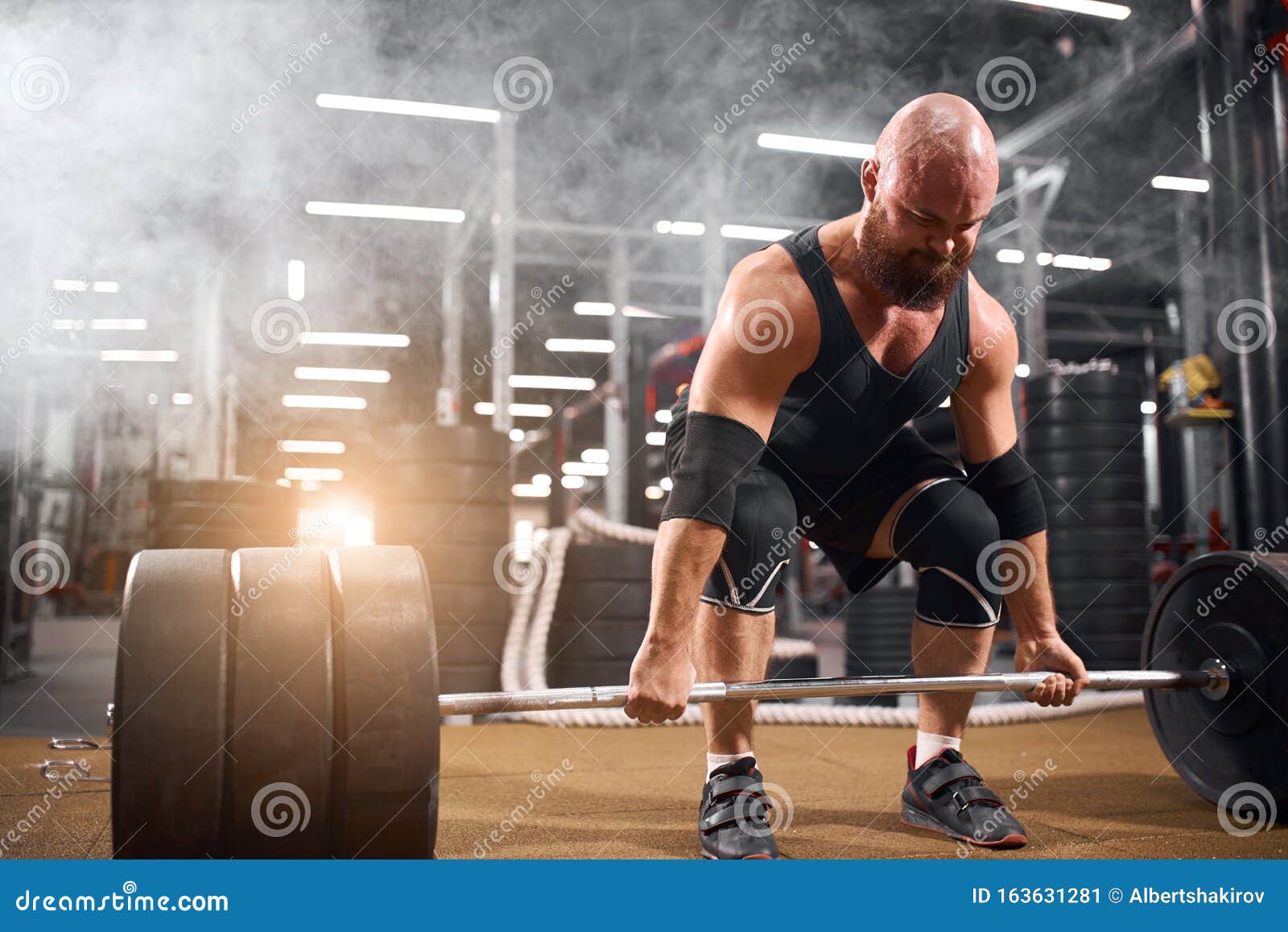 https://thumbs.dreamstime.com/z/hairless-severe-bodybuilder-doing-barbell-squats-modern-fitness-center-brutal-man-practicing-training-using-gym-equipment-163631281.jpg