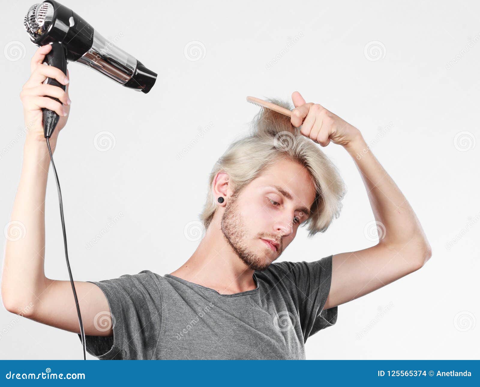 Young Man Drying Hair with Hairdryer Stock Photo - Image of vain, hairstyle: 125565374 Young Man Drying Hair with Hairdryer Stock Photo - Image of vain, hairstyle: 125565374