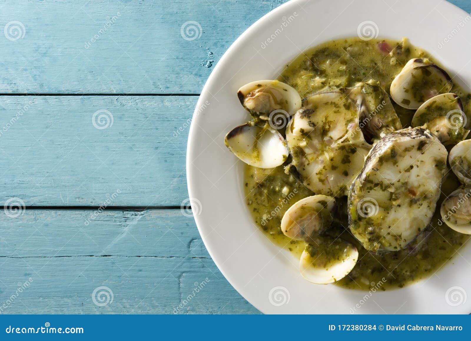 Hake Fish and Clams with Green Sauce Stock Photo Image of blue, steak