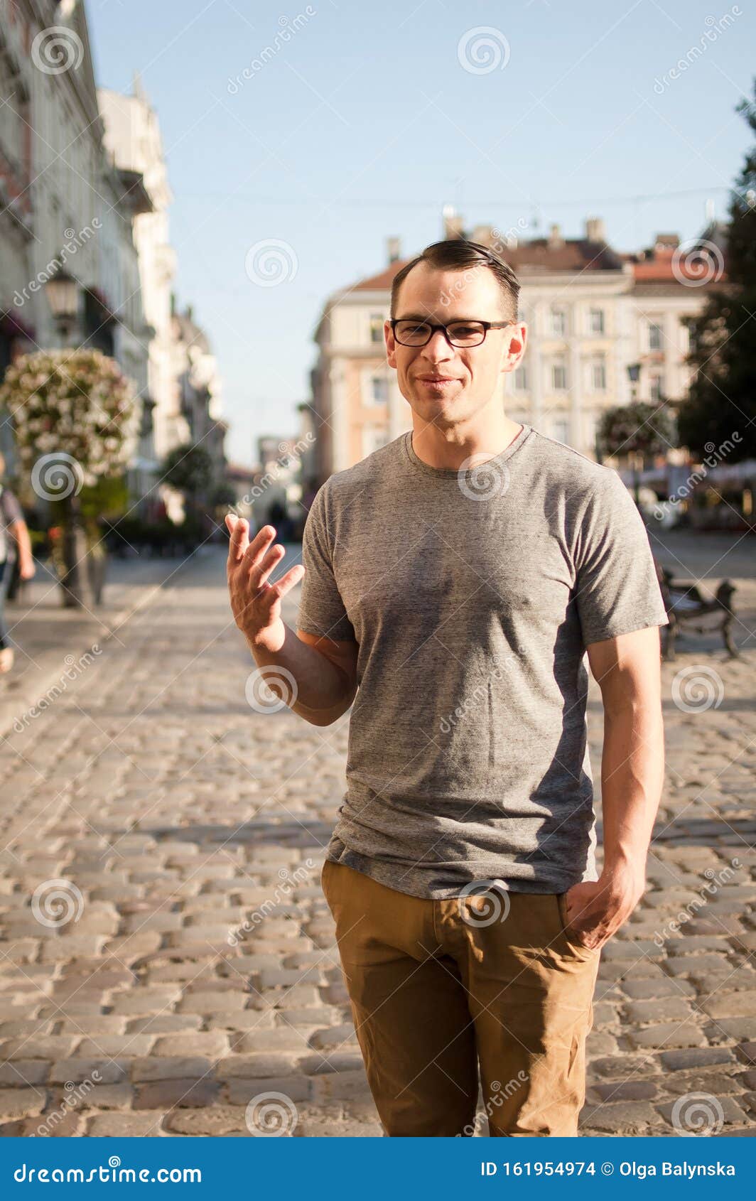 Half Body Shot Of Young Man In A Street Of An Old Town In ...