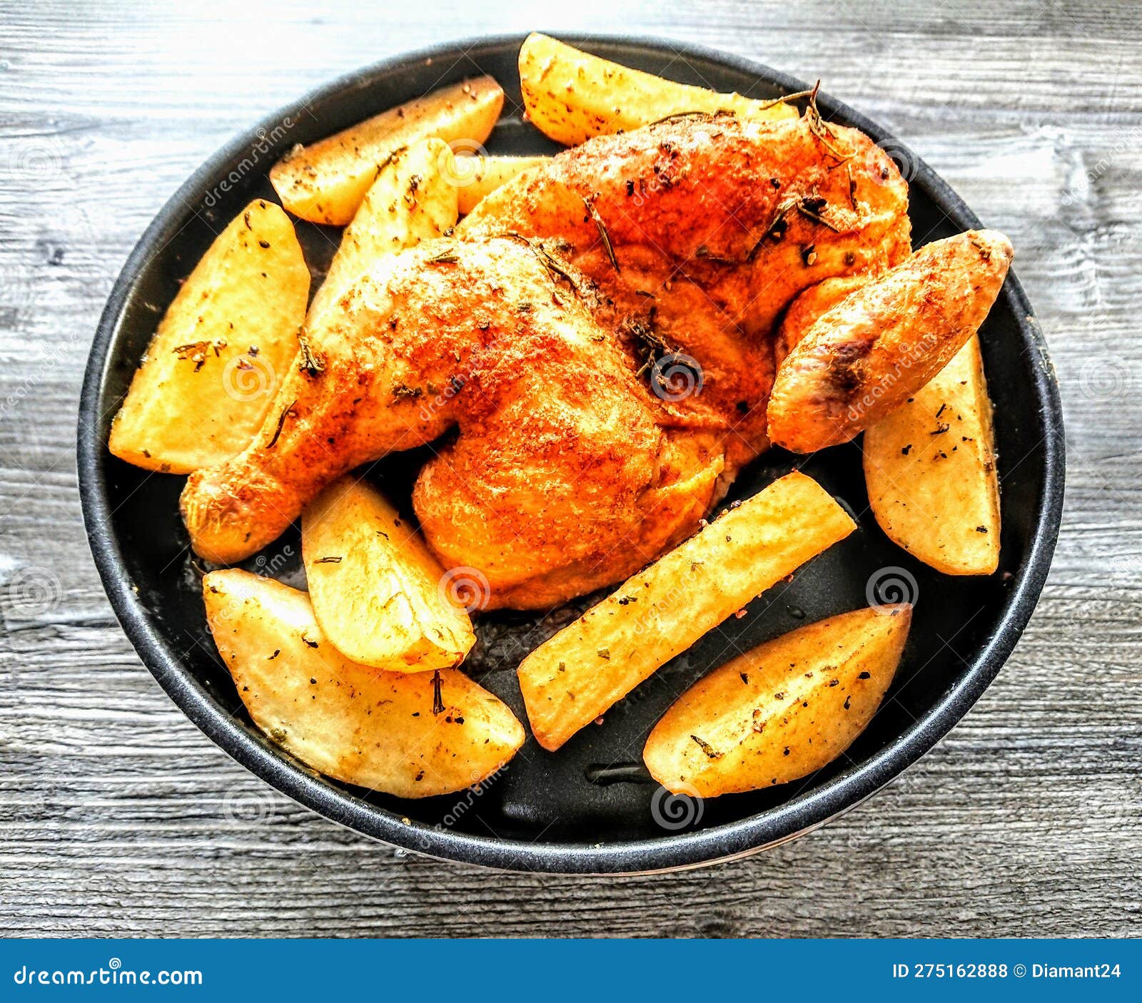 Half Chicken Roasted with Potato Wedges on Plate Stock Photo Image of