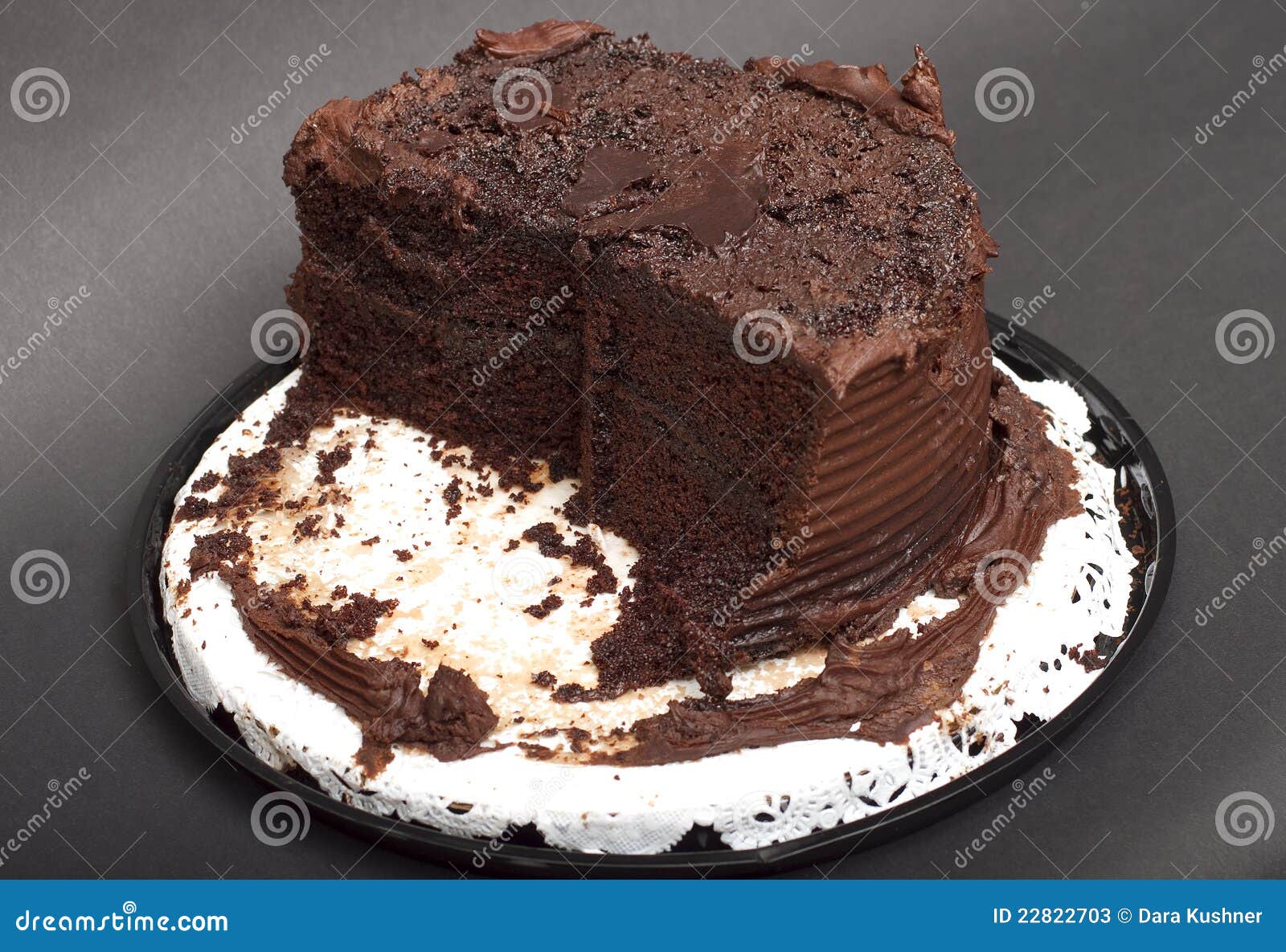 half-eaten-chocolate-frosted-cake-22822703.jpg