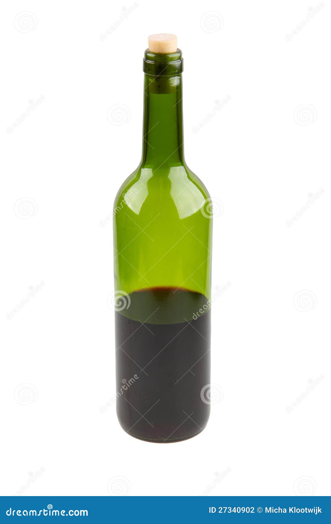 Big Glass Bottle of Wine Empty, on Green Grass Background. Stock