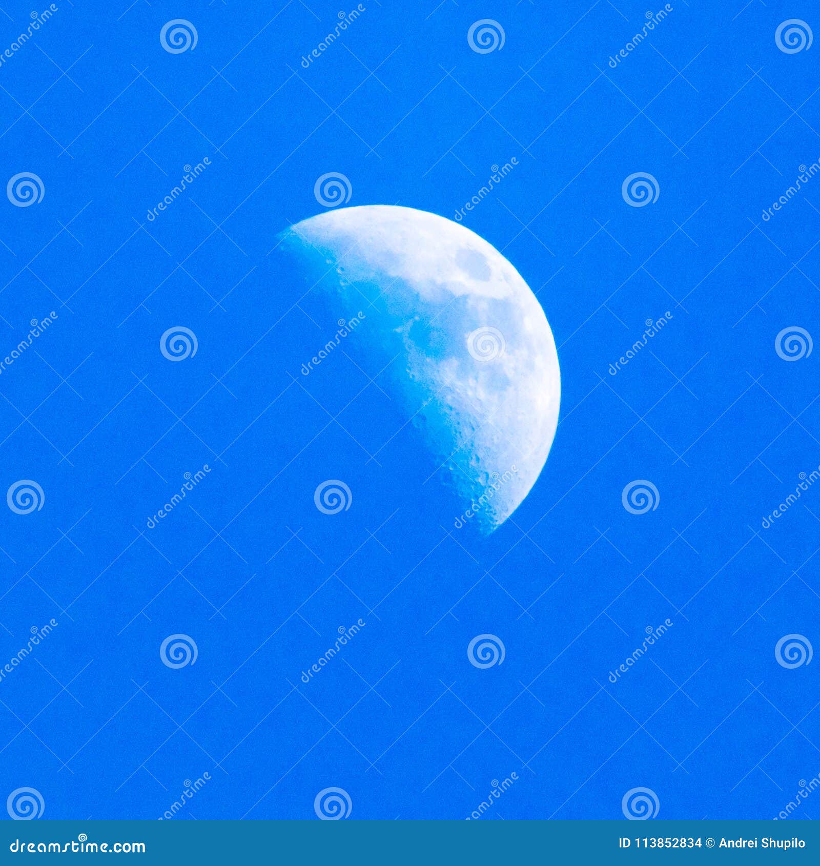 Half of the Moon in the Blue Sky Stock Photo - Image of cloudscape ...
