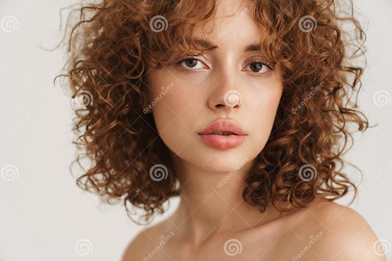 Half Naked Ginger Woman Posing And Looking At Camera Stock Image
