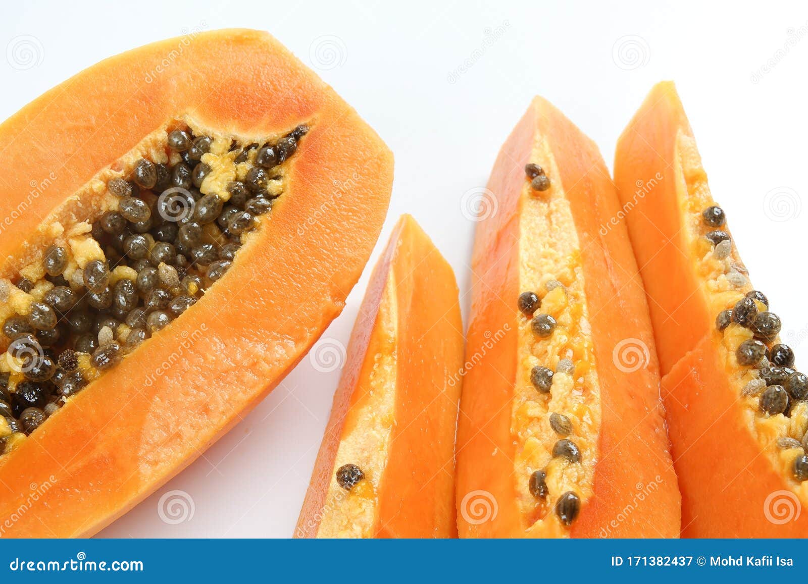 Half and Slices Papaya on White. Stock Image Image of pulp, color