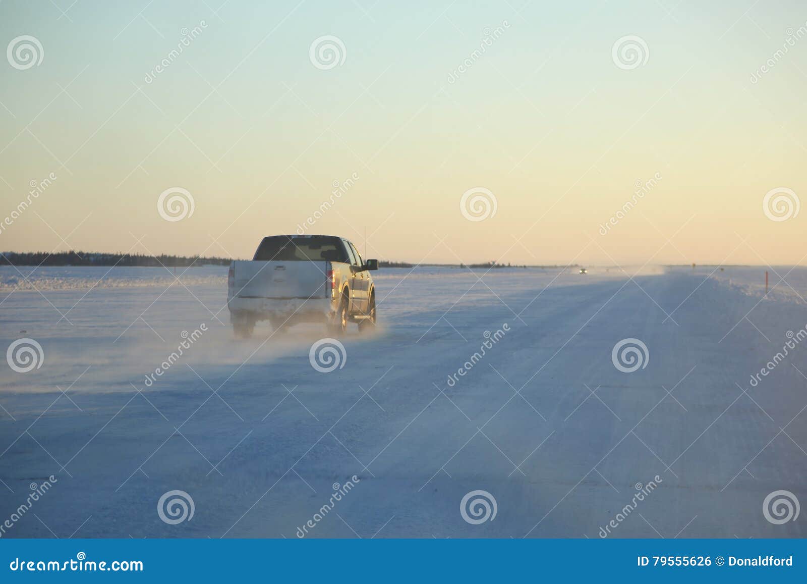 half tun pickup on ice road, yellowknife, canada