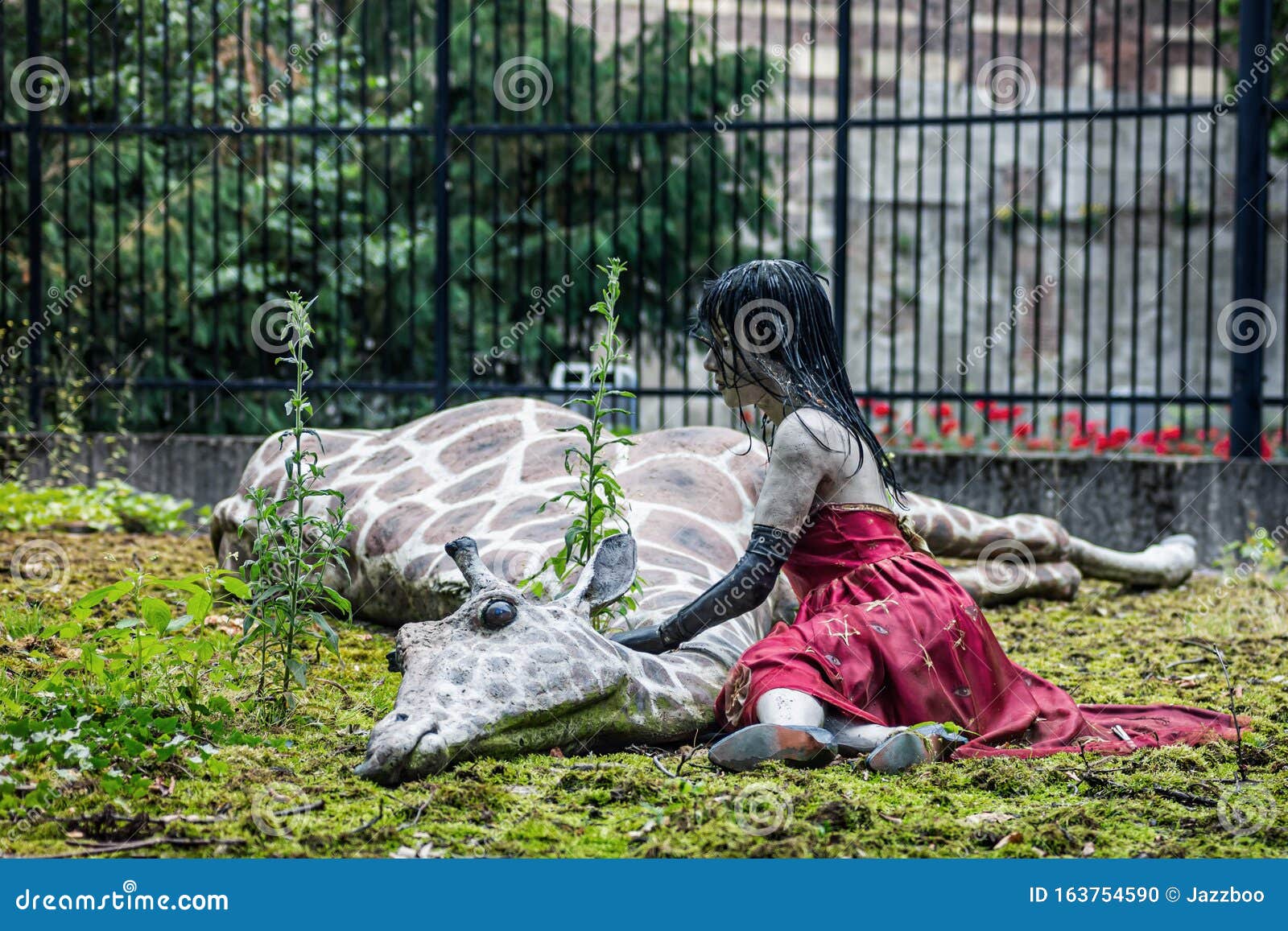 Giraffe In A Zoo With The Public Editorial Photo | CartoonDealer.com