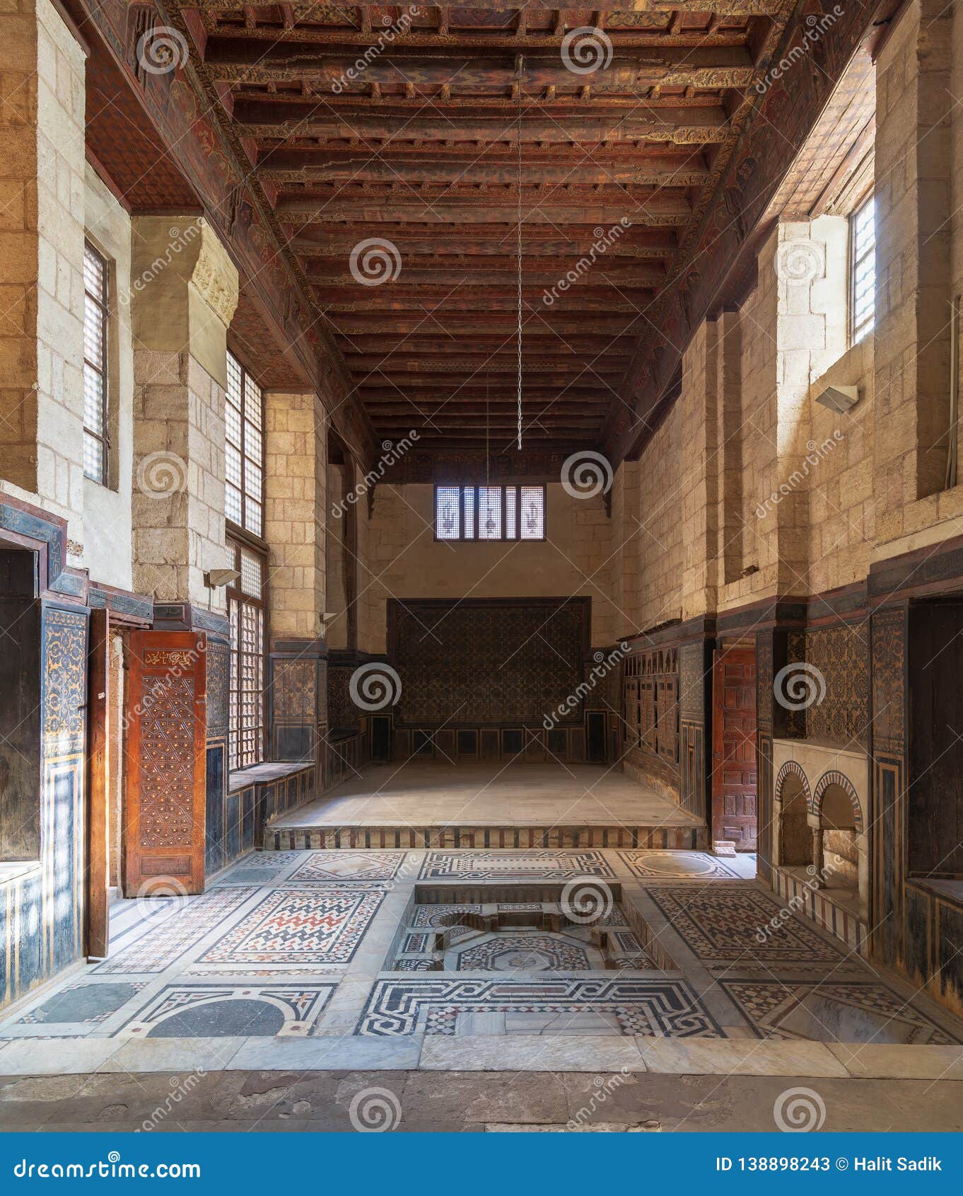 hall at ottoman era historic house of moustafa gaafar al seleehdar, cairo, egypt with decorated ceiling and ornate marble floor