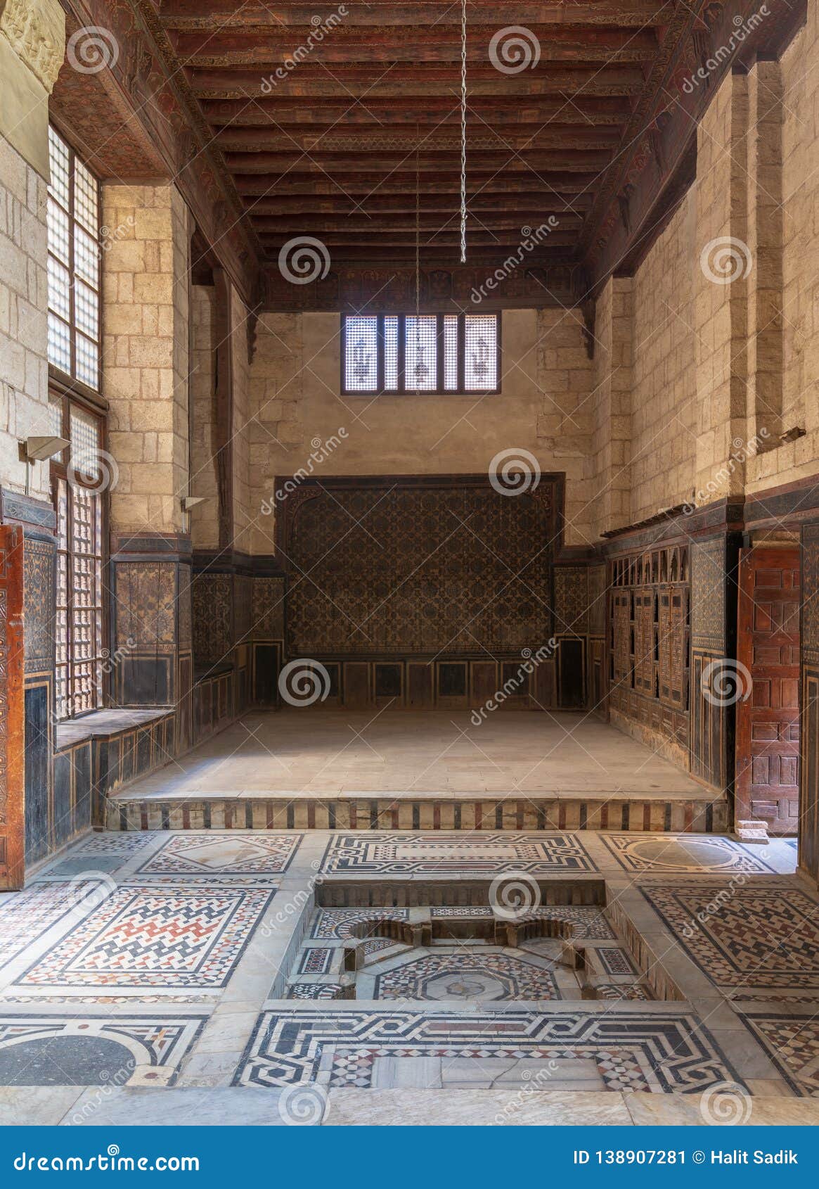 hall at ottoman era historic house of moustafa gaafar al seleehdar, cairo, egypt with decorated ceiling and ornate marble floor