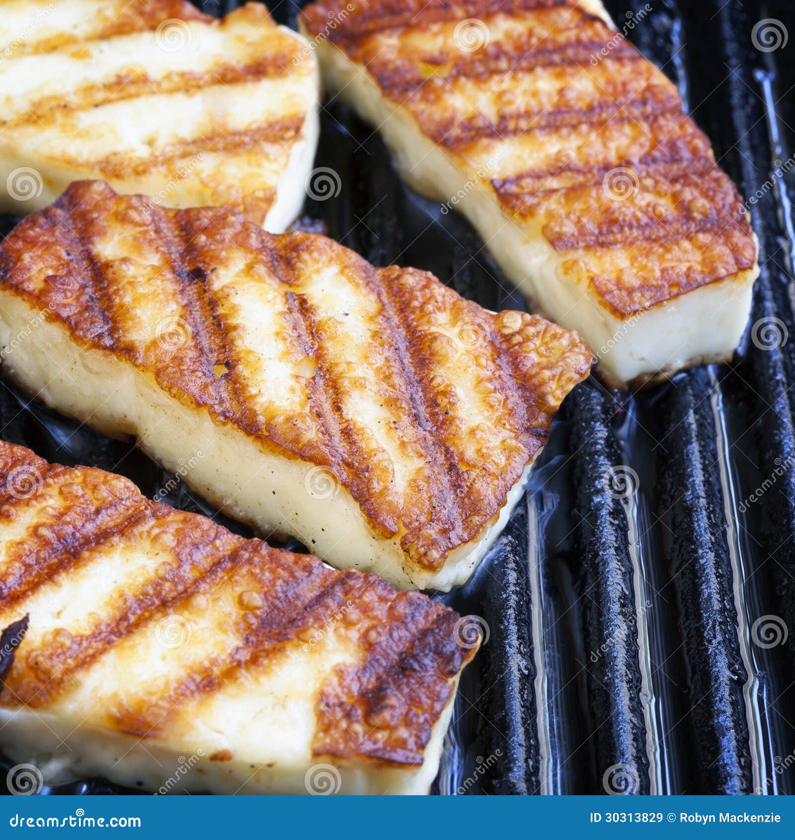Grilling Halloumi Cheese stock image. Image of frying - 30313829