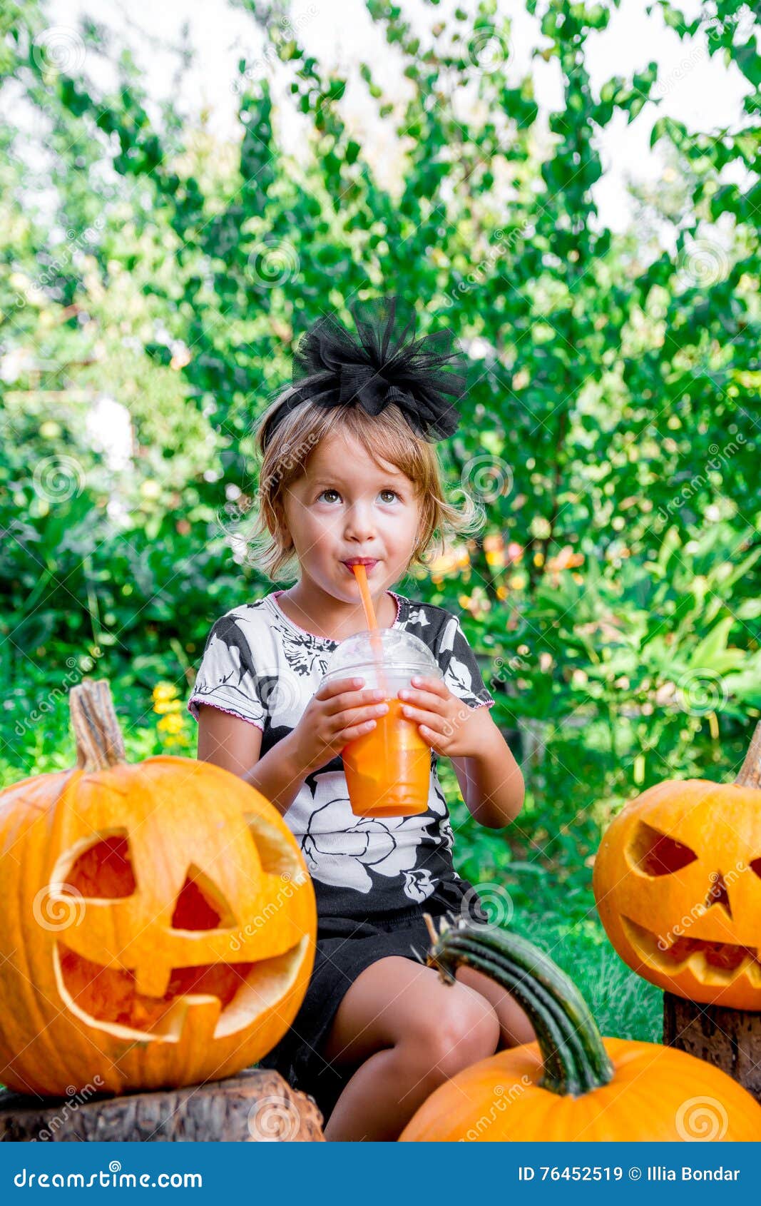 Halloween. Child Dressed in Black Drinking Pumpkin Cocktail, Trick or ...