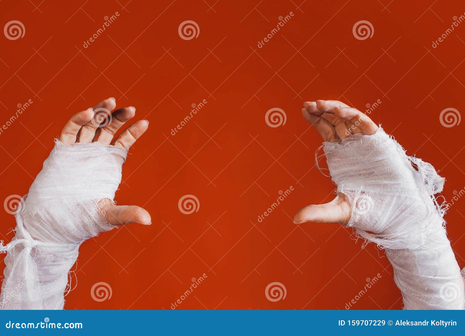 halloween, costume image. the mummy`s hand in bandages making gestures