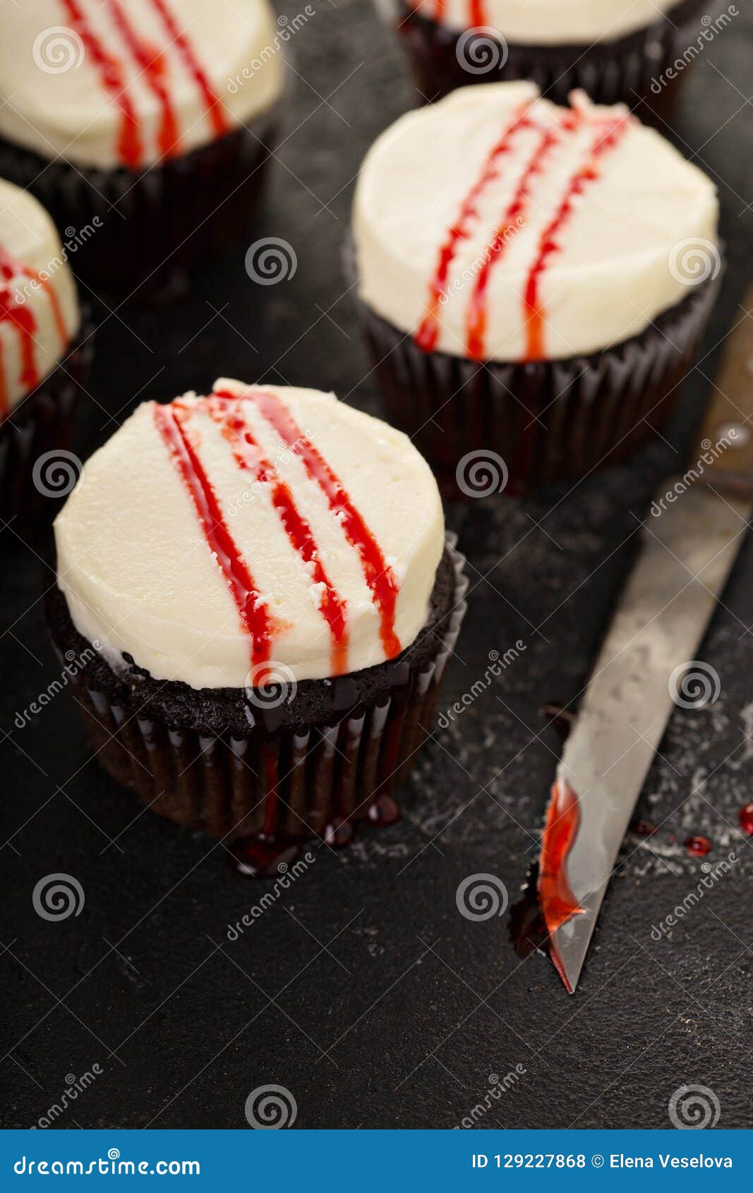 Halloween Creepy Cupcakes with Raspberry Syrup Stock Photo - Image of ...