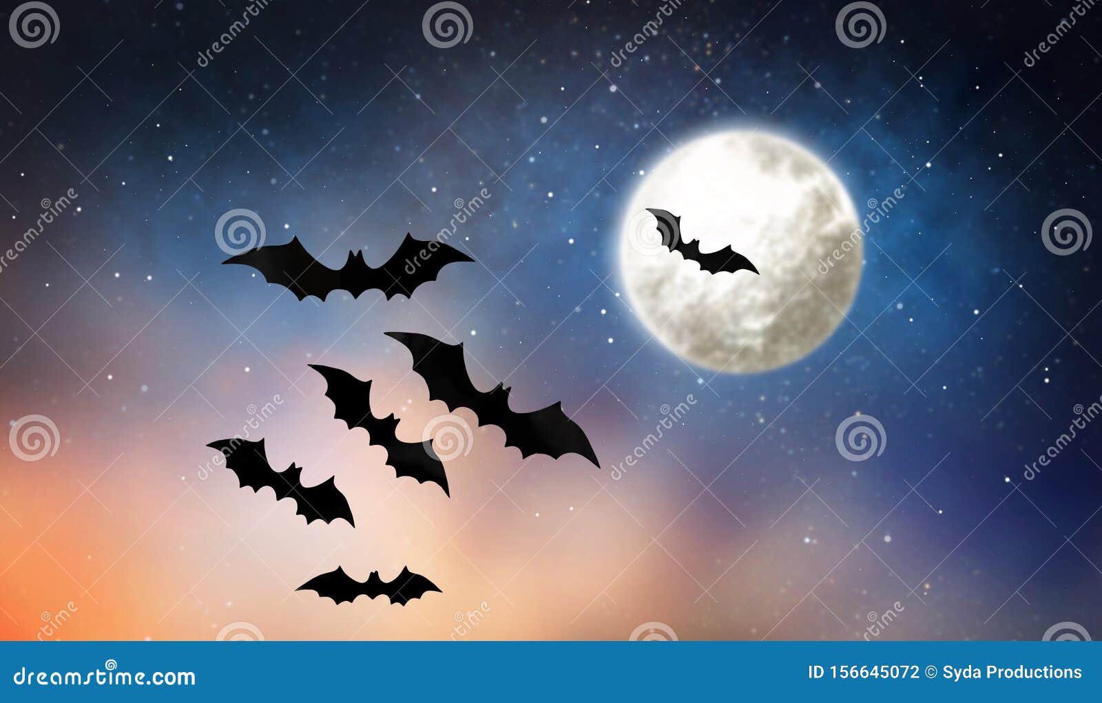 Black bat in a pumpkin field during a full moon wood ornament painting