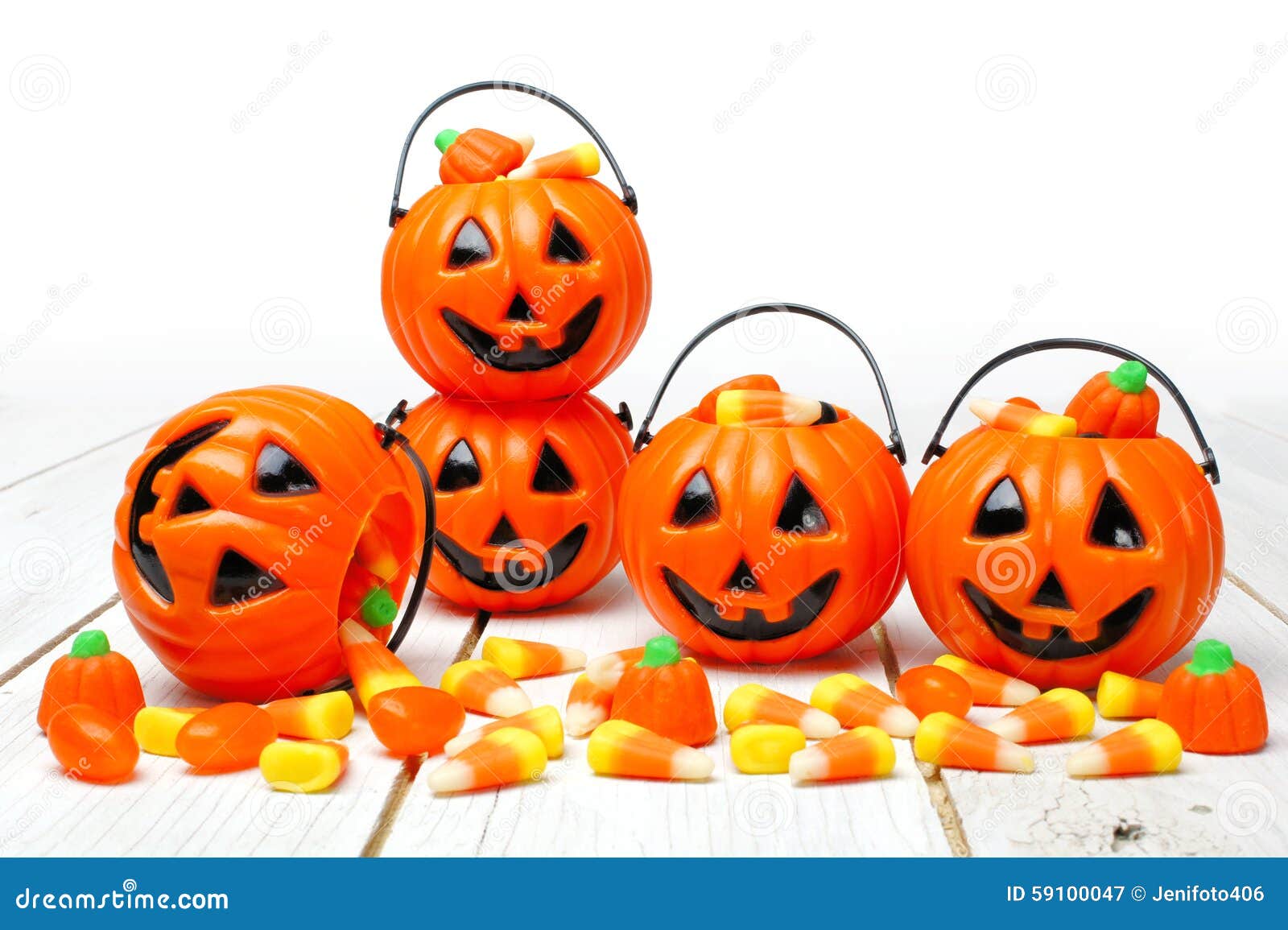 halloween jack o lantern candy holders on white wood
