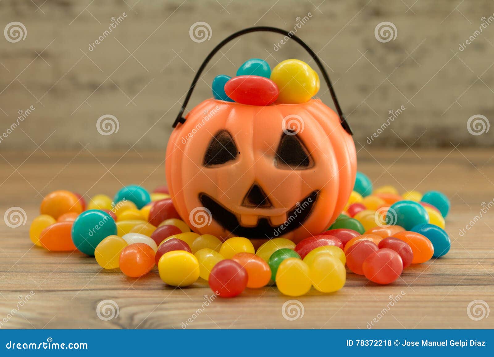 Halloween Pumpkin Basket Full of Candies Stock Photo - Image of food ...