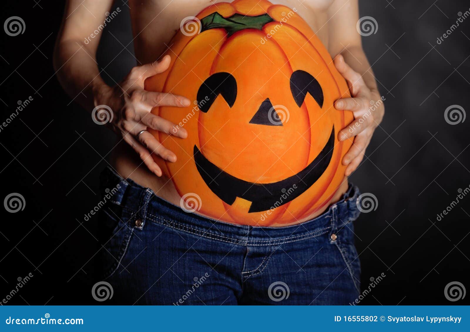 Halloween Pumpkin Painted on Belly of Pregnant Stock Photo Image of