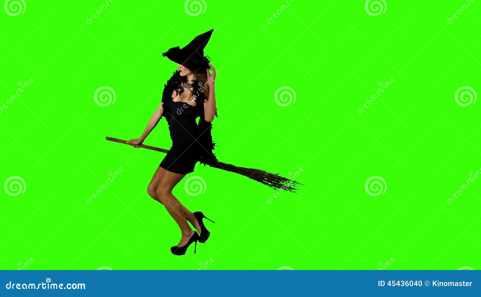Halloween Witch Flying on a Broomstick Green Stock Footage Video of