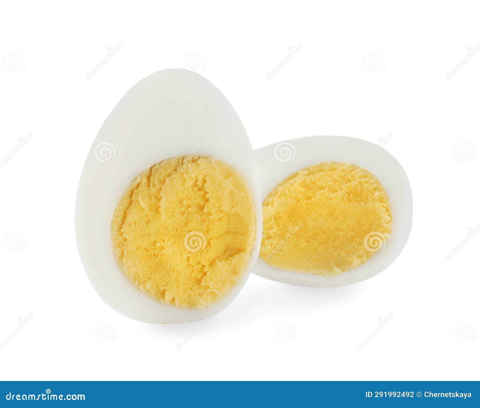 Halves of Peeled Hard Boiled Quail Egg on White Background Stock Photo
