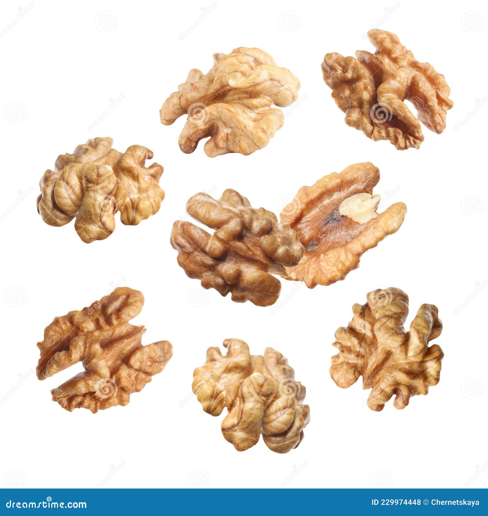 Halves of Walnuts Falling on White Background Stock Photo Image of