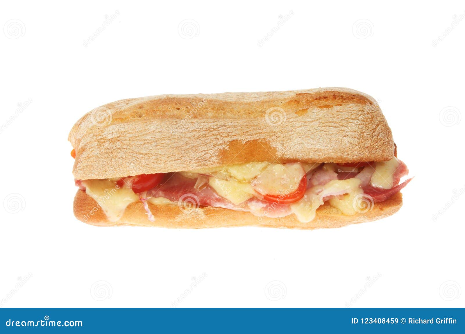 Ham, cheese and tomato toasted ciabatta roll isolated against white