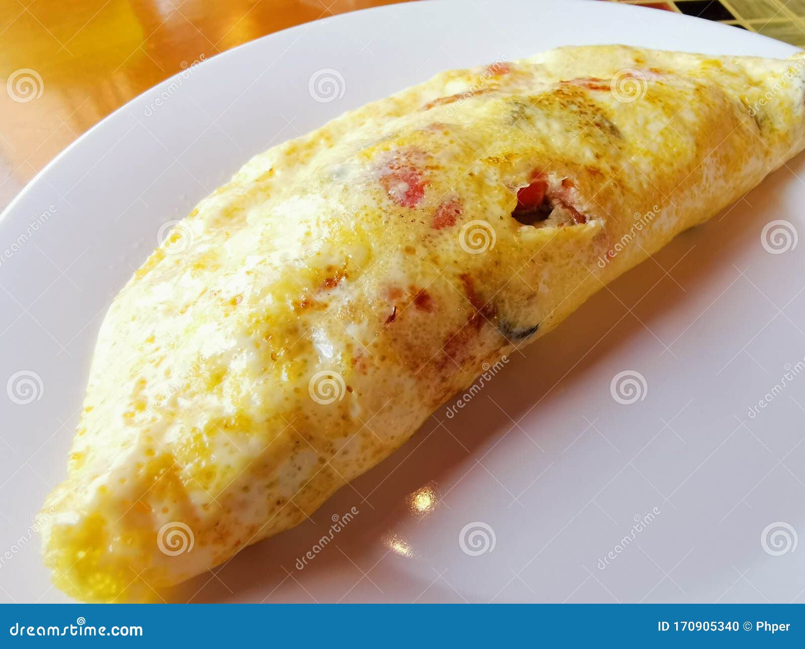 Ham, Vegetables and Cheese Egg Omelette on a Plate Stock Photo Image