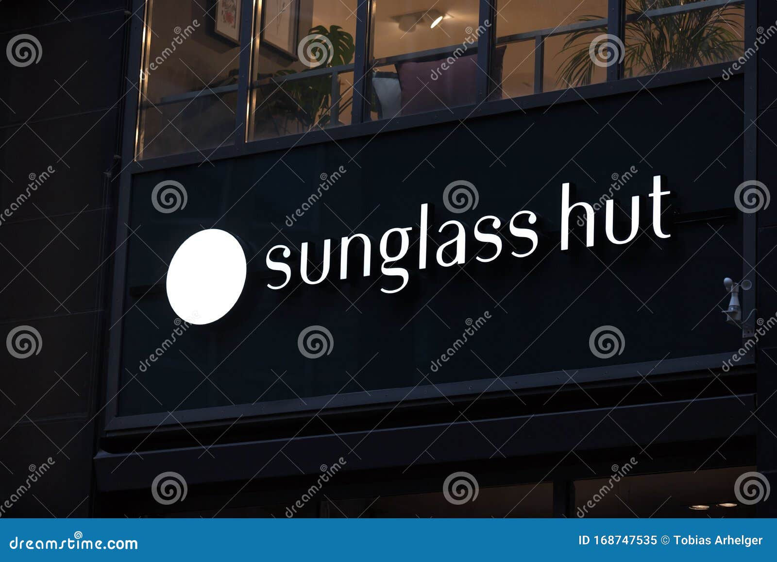 Sunglass Hut Sign in Hamburg Germany Editorial Image Image of white