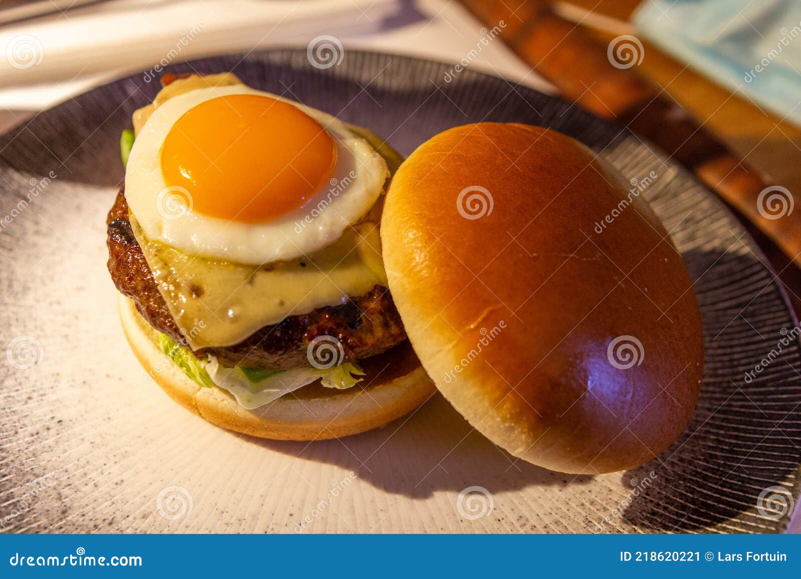 Hamburger with a fried egg stock image. Image of snack 218620221