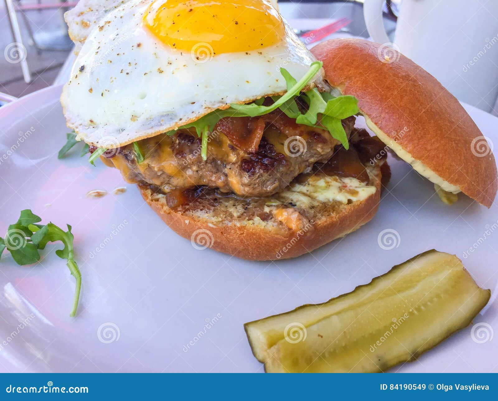Hamburger with Pickles in Restaurant Stock Image Image of grilled