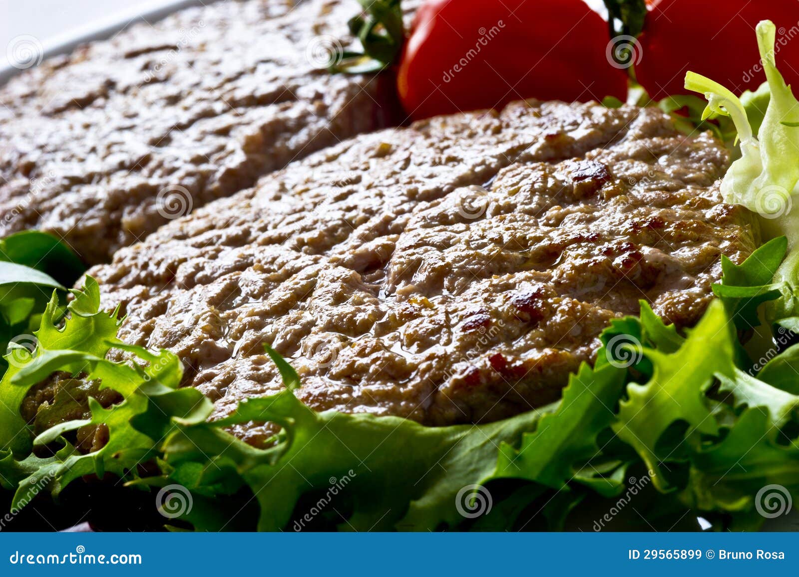 Hamburger with Tomatoes, Salad and Green Beans Stock Image Image of