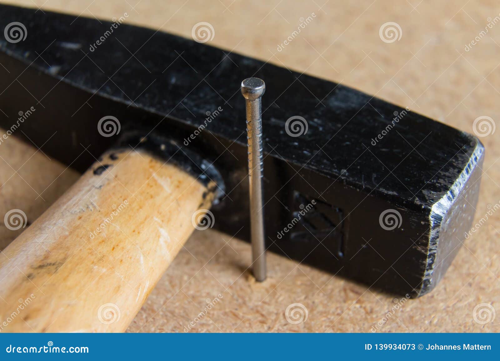 Hammer and a Nail stock image. Image of closeup, carpentry 139934073