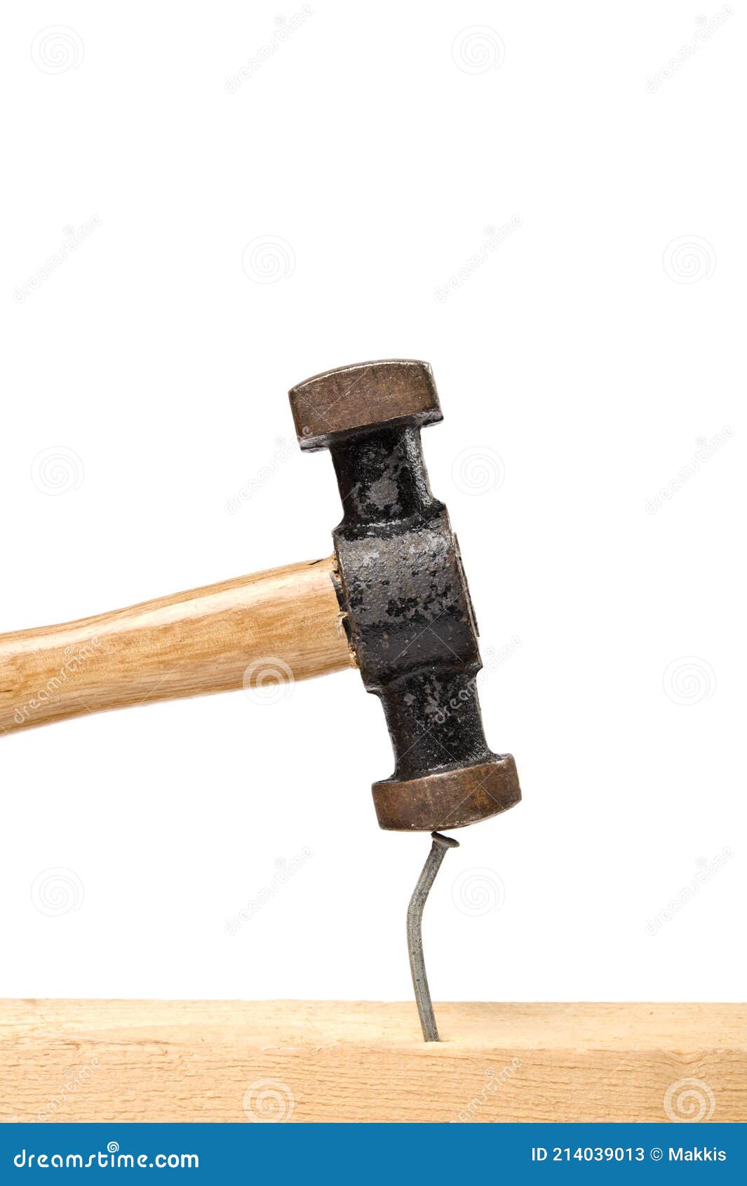Old hammer hitting a nail stock image. Image of background 214039013