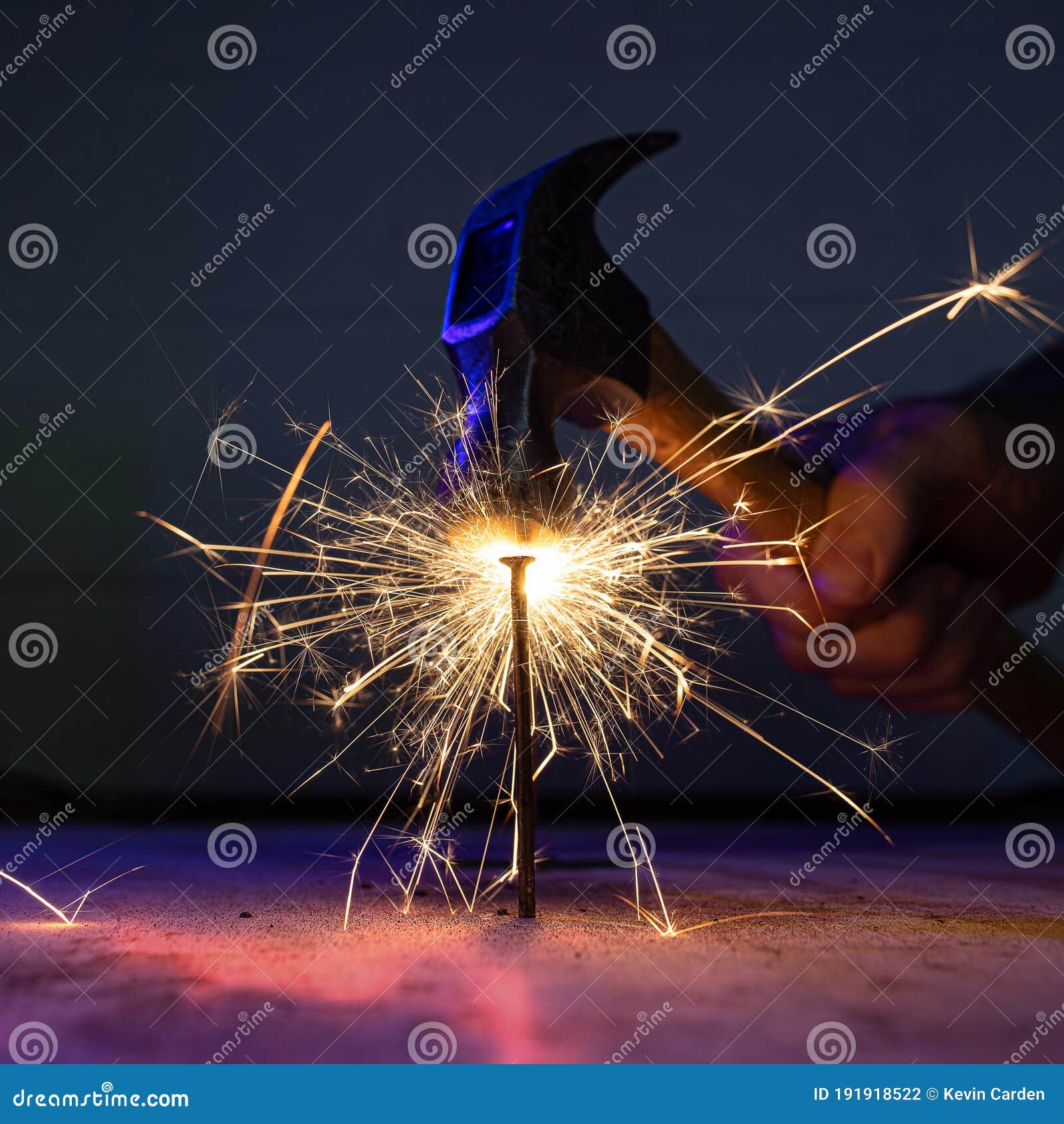 Hammer and Nail stock photo. Image of sparkler, spark 191918522