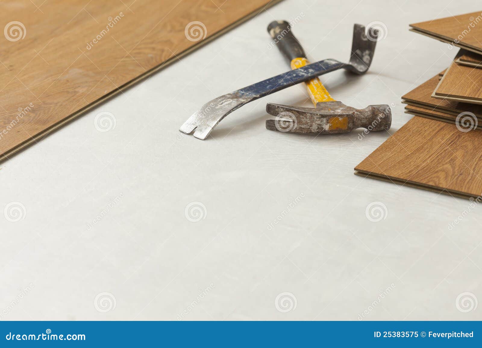 Hammer and Pry Bar with Laminate Flooring Abstract Stock Image Image