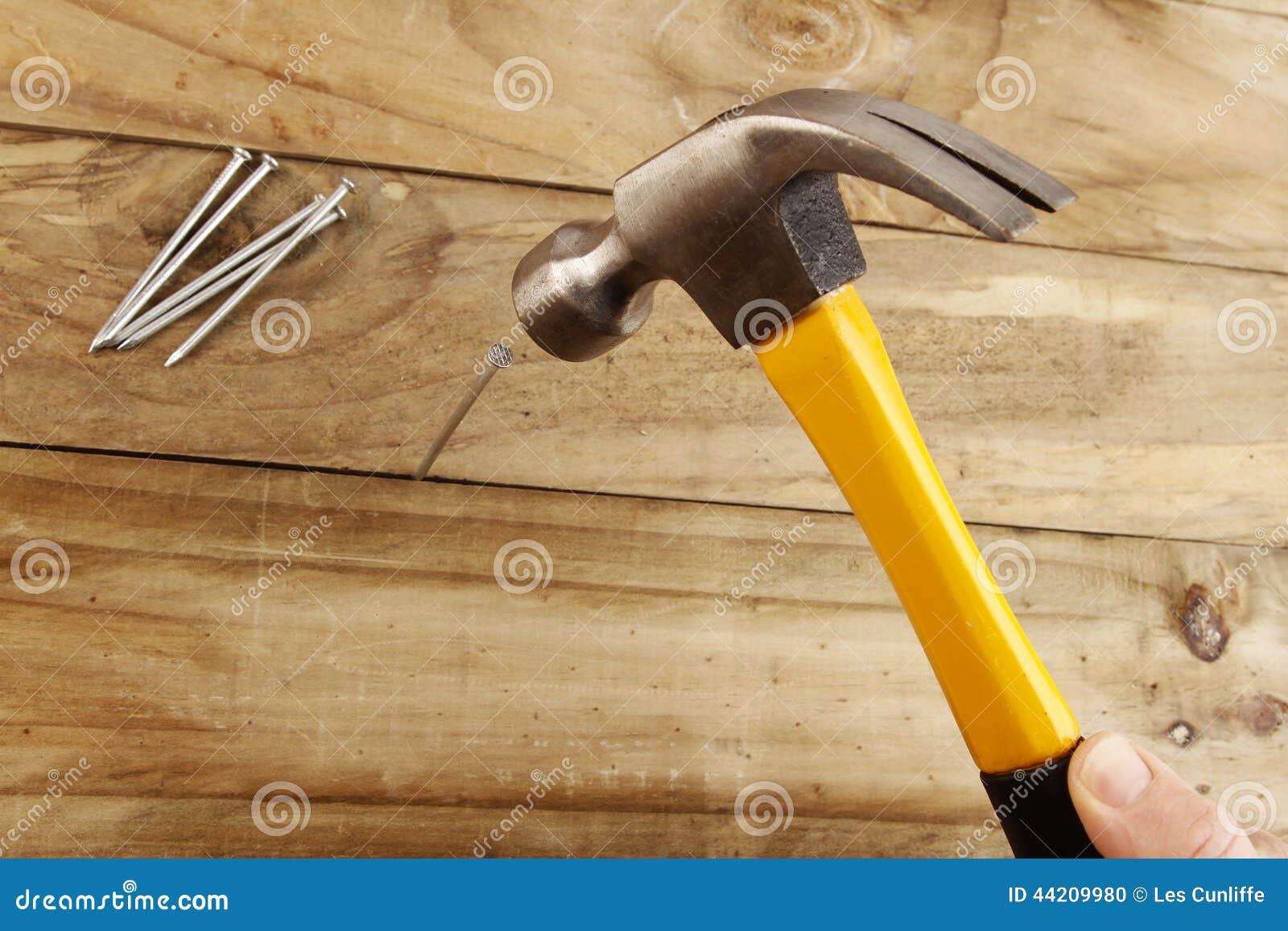 Hammering nail stock photo. Image of handyman, decking 44209980