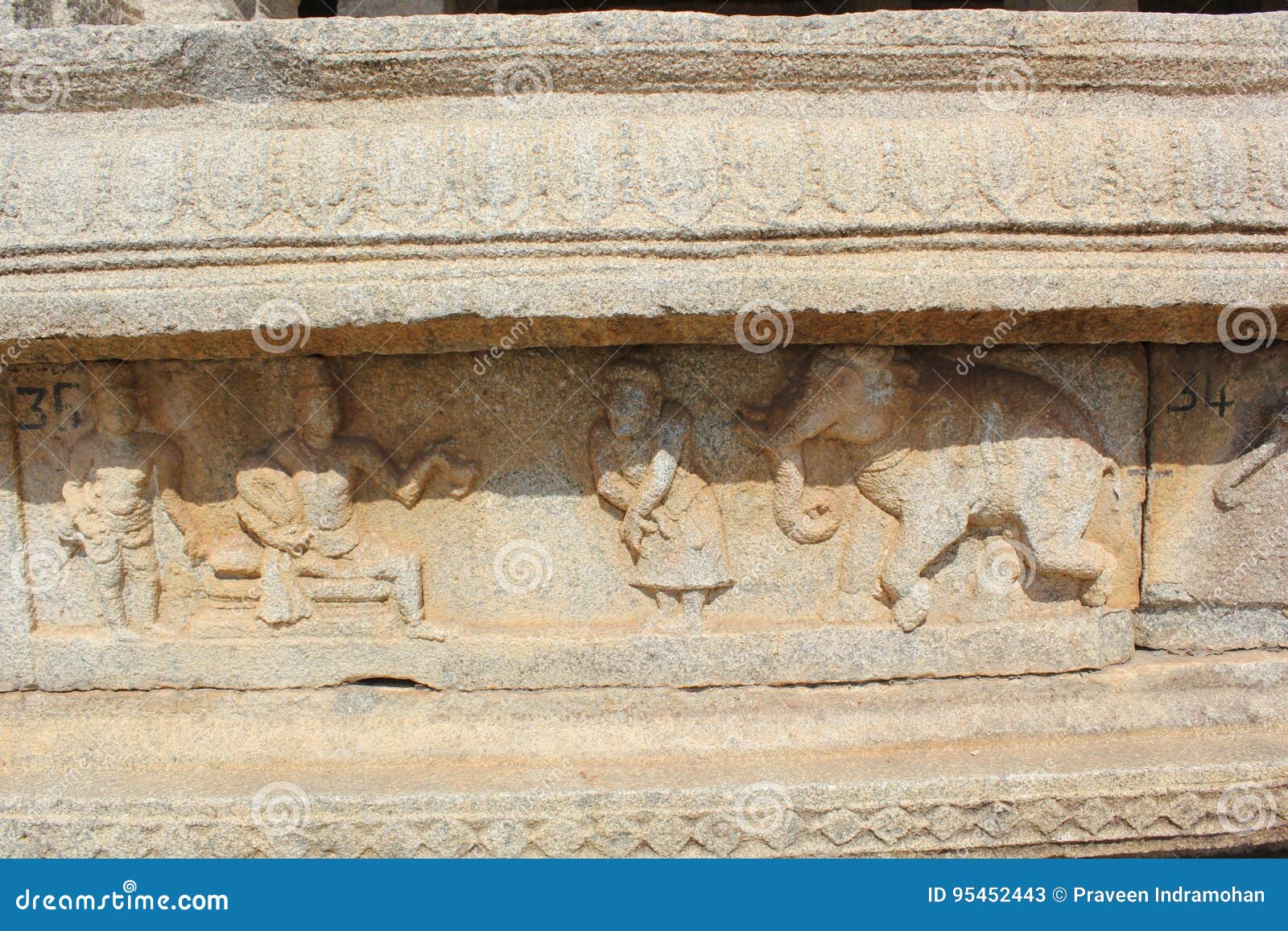 hampi vittala temple wall carving of king krishnadevaraya and his courtier talking to an elephant trader