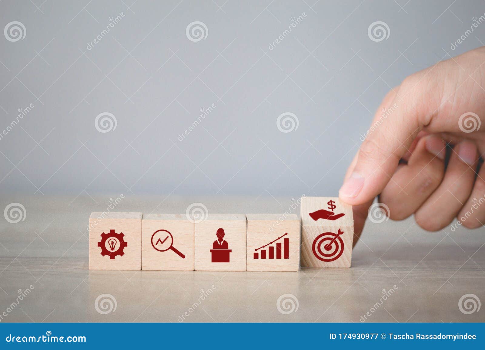 hand arranging wood block stacking with icon arrow and business,targeting